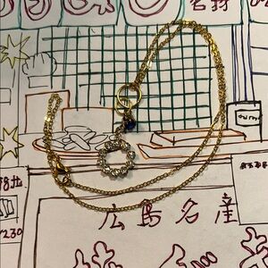 Elegant Gold Necklace with Crystal Pendant